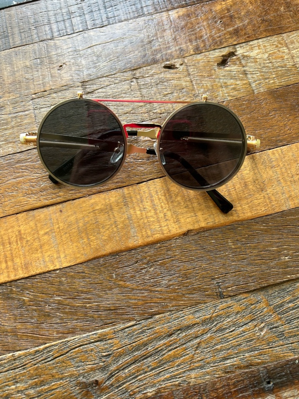 Round Flip Up Sunglasses in Gold with Black Lenses
